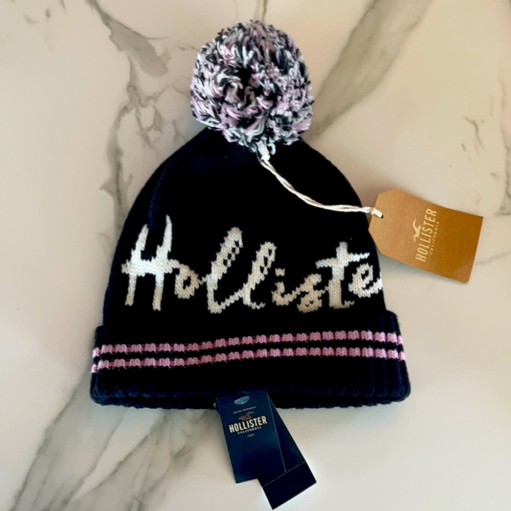 Brand new never worn pink, black and white beanie